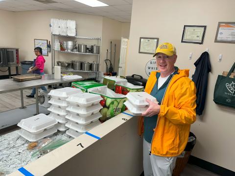 volunteer delivering food