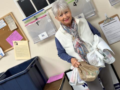 volunteer delivering supplies